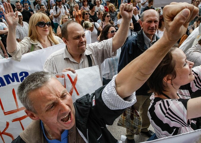 Betogers nemen deel aan een anti-holebimars in Kiev, in 2013.