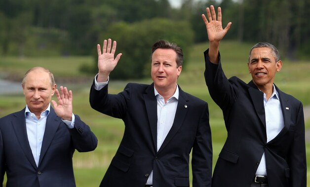 De Russische president Vladimir Poetin, de Britse premier David Cameron en de Amerikaanse president Barack Obama op de G8 op 18 juni 2013.