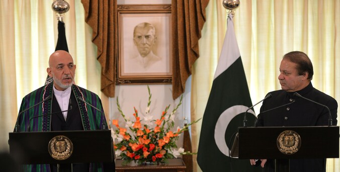 De Afghaanse president Hamid Karzai (links) en de Pakistaanse premier Nawaz Sharif (rechts).