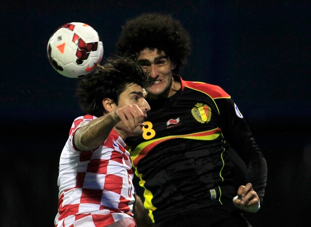 Fellaini zag geel en mist Wales.