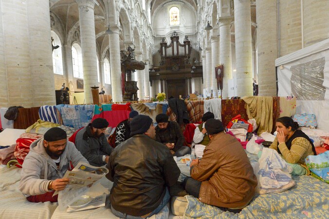 Afghaanse asielzoekers die in november vorig jaar een onderkomen vonden in de Brusselse Begijnhofkerk.