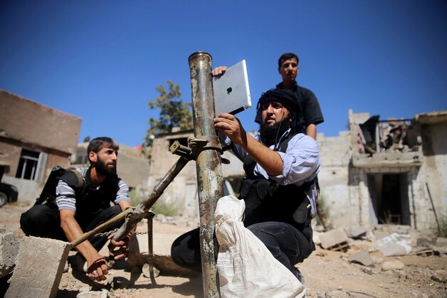 Rebellen in de buurt van Damascus, op een archiefbeeld uit 2013.