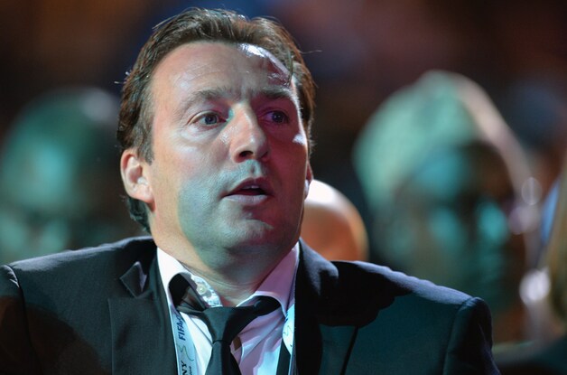 Marc Wilmots slaakt een zucht van opluchting in Costa do Sauipe tijdens de WK-loting.