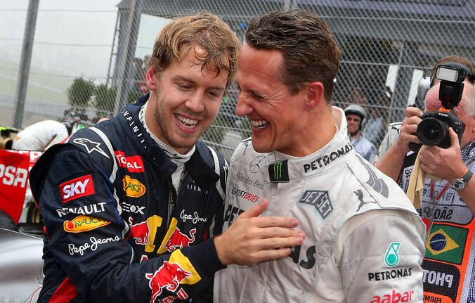 Vettel en Schumacher (r).
