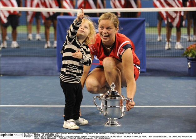 Kim met haar dochtertje Jada na haar Grand Slam-overwinning in New York in 2009.