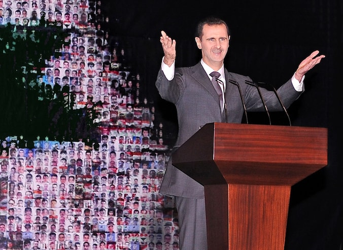 Assad zou op een oorlogsschip "onder Russische bewaking" verblijven.