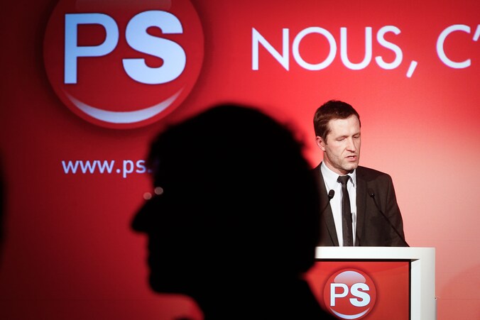 Premier Di Rupo in de schaduw van zijn PS-voorzitter Paul Magnette.