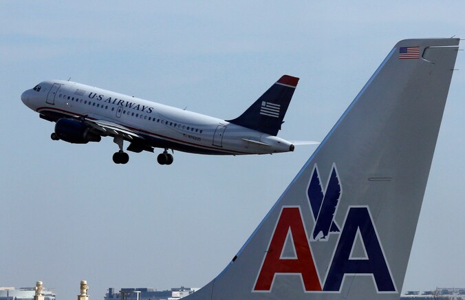 De samensmelting van US Airways en American Airlines zal zorgen voor de grootste luchtvaartmaatschappij ter wereld.