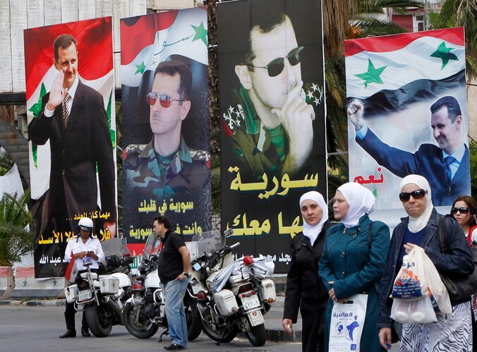 Verkiezingsposters van president Assad in de hoofdstad Damascus.