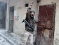 Een strijder van het Vrije Syrische Leger in Aleppo.