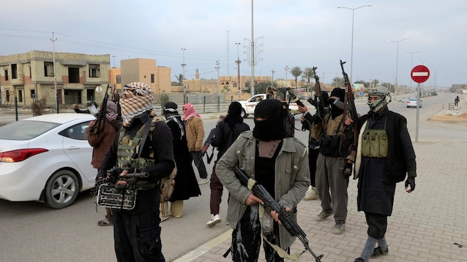 Strijders in Ramadi, vermoedelijk van de Islamitische Staat van Irak.