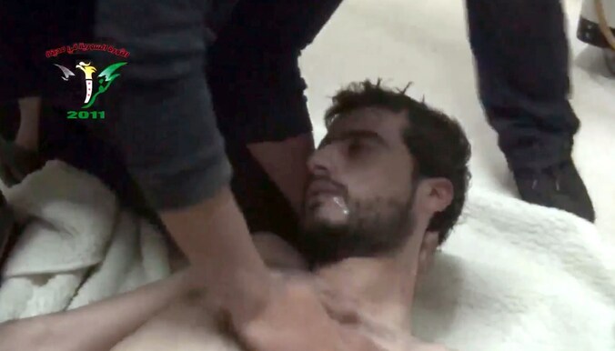 Slachtoffer van een chemische aanval door de troepen van president Assad, in april 2014.