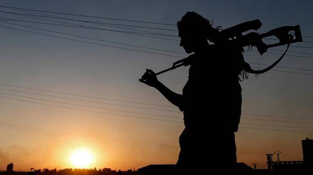 Een strijder van de Koerdische militie YPG in Noord-Syrië.