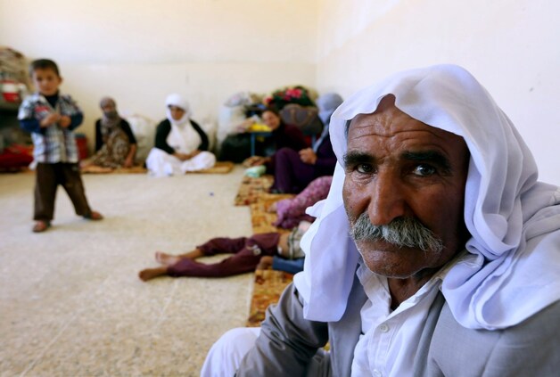 Een yezidi-familie die het geweld is ontvlucht en nu schuilt in autonoom Koerfisch gebied.