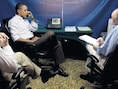 Een foto van Barack Obama uit 2011, toen hij in Argentinië in zijn afluistervrije tent werd bijgepraat over de situatie in Libië.