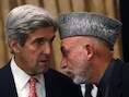 Voormalig VS-presidentskandidaat John Kerry vloog naar Afghanistan om Karzaï te overtuigen.