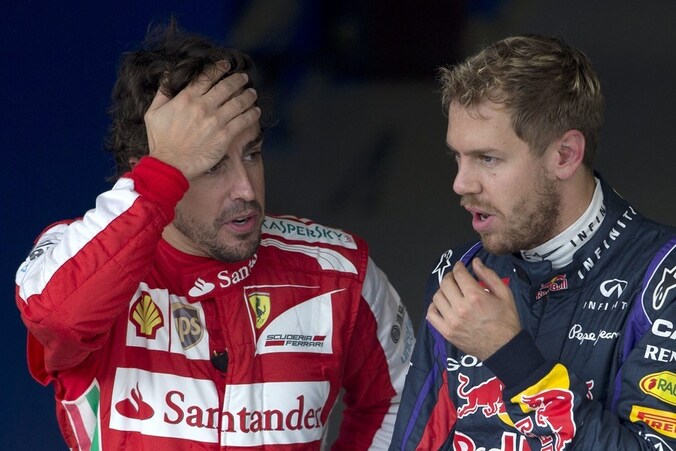 Ferrari-rijder Alonso (links) en Vettel