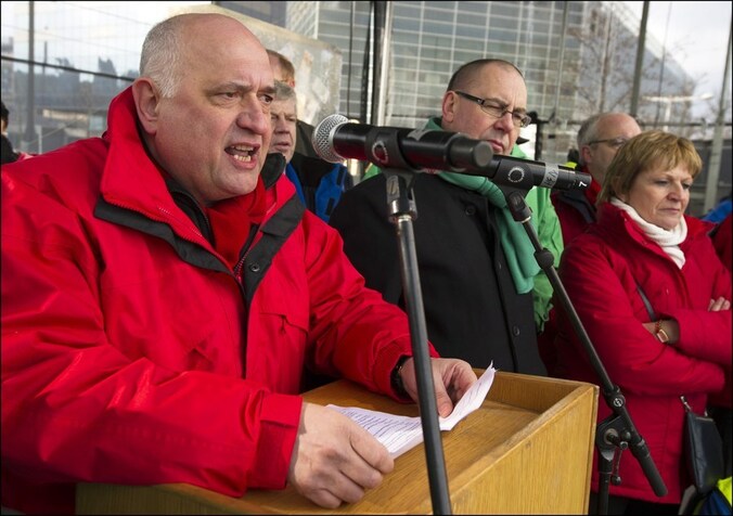 Rudy De Leeuw (ABVV) en Marc Leemans (ACV).