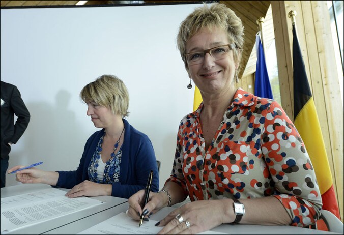Huytebroeck (rechts) wil een belasting van 500 euro per jaar te heffen per parkeerplaats die te veel werd gebouwd.
