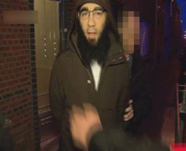Fouad Belkacem wordt meegenomen voor verhoor.