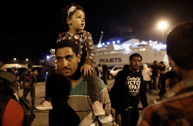 Syrische vluchtelingen in de haven van Piraeus.