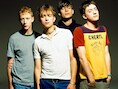 Blur, met Alex James als derde van rechts.