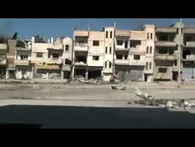 Op video's zijn de vernielingen in de wijk Baba Amr duidelijk te zien.
