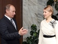 De Russische president Vladimir Poetin met Joelia Timosjenko in 2009.