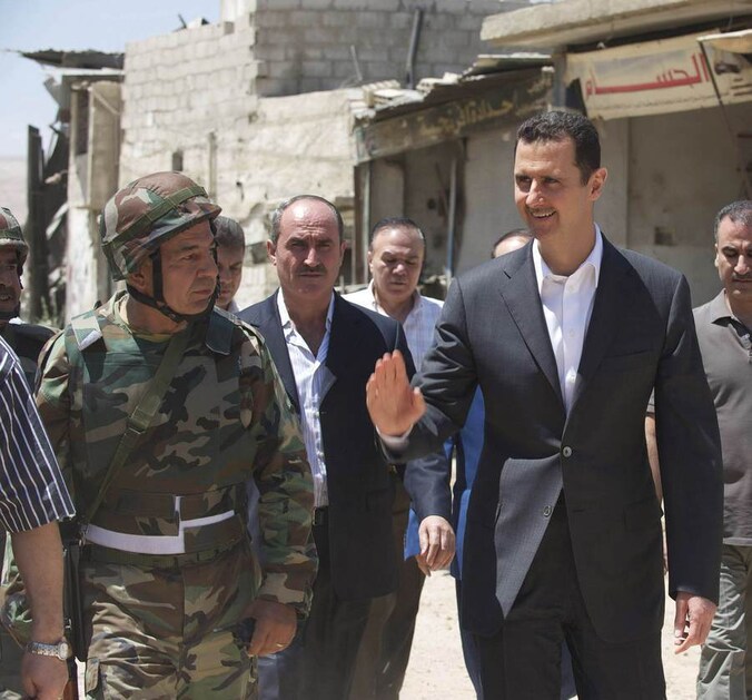 De Syrische president Bashar al-Assad vorige week in Daraya.