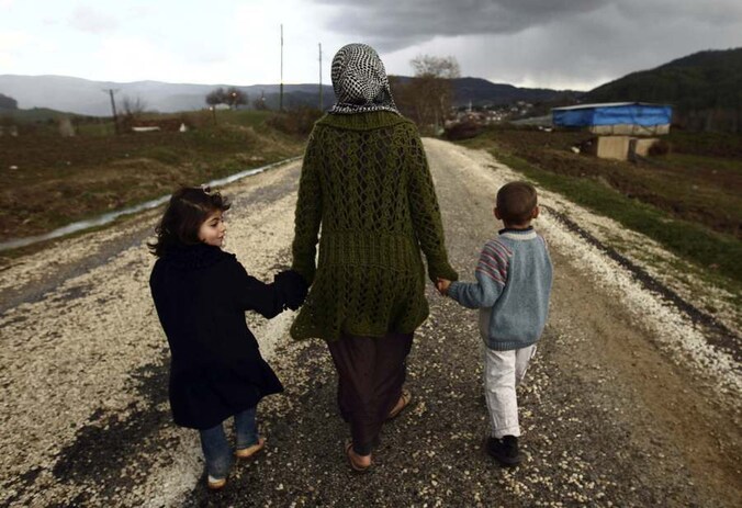 Syrische vluchtelingen bij de grens van Turkije.