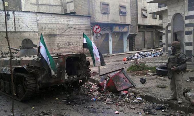 Uit deze foto van de Nationale Raad moet blijken dat het regime de grote middelen inzette tegen de demonstranten in Homs.
