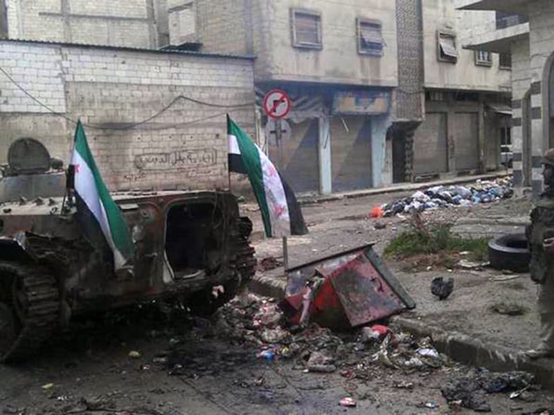 Uit deze foto van de Nationale Raad moet blijken dat het regime de grote middelen inzette tegen de demonstranten in Homs.