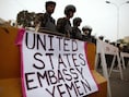 Archieffoto: oproerpolitie bij de Amerikaanse ambassade in Sana'a, Jemen, juni 2013.