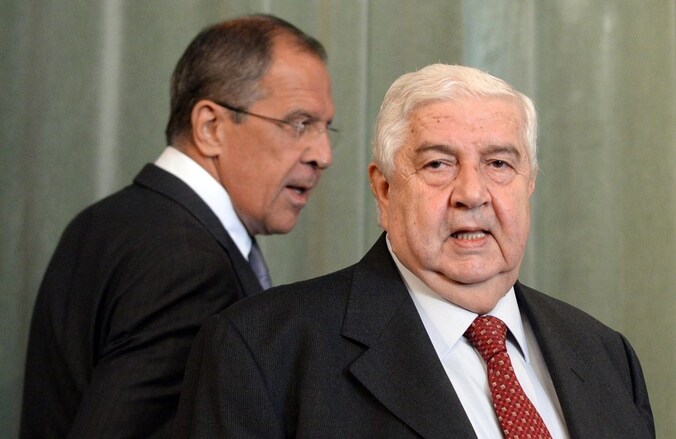 De Russische buitenlandminister Sergej Lavrov (links) en zijn Syrische ambtgenoot Walid Muallem.
