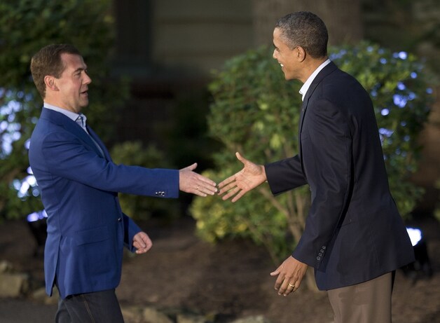 Russische premier Dmitry Medvedev en Obama.