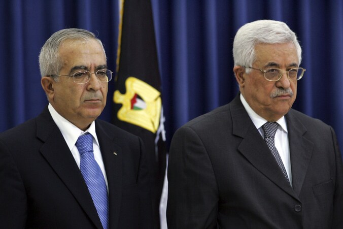 Salam Fayyad (links) naast Mahmoud Abbas.
