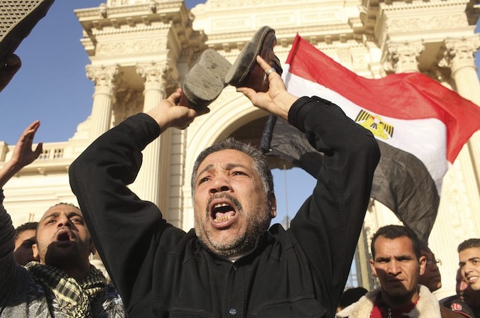Een Egyptenaar op een betoging tegen president Mursi.