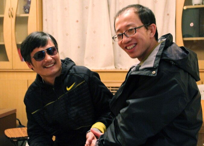 Chen Guangcheng (l) en Hu Jia (r).