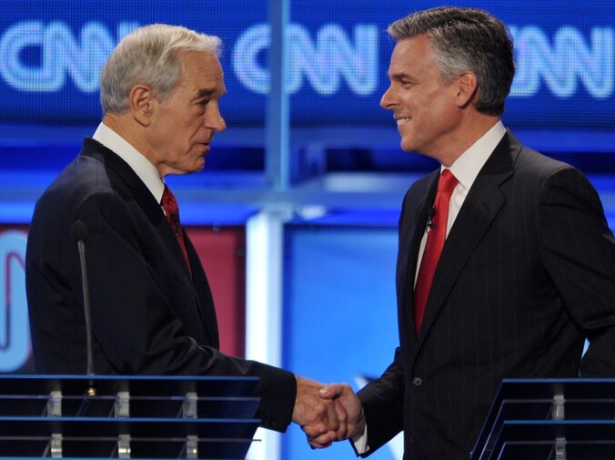 Ron Paul en Jon Huntsman op een ander debat.