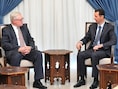 De Russische viceminister van Buitenlandse Zaken Sergei Ryabkov in gesrek met de Syrische president Assad.