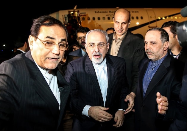 Mohammad Javad Zarif (midden), de Iraanse minister van Buitenlandse Zaken.