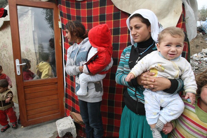 Syrische vrouwen met kinderen. De polio-slachtoffers zijn jonge kinderen.