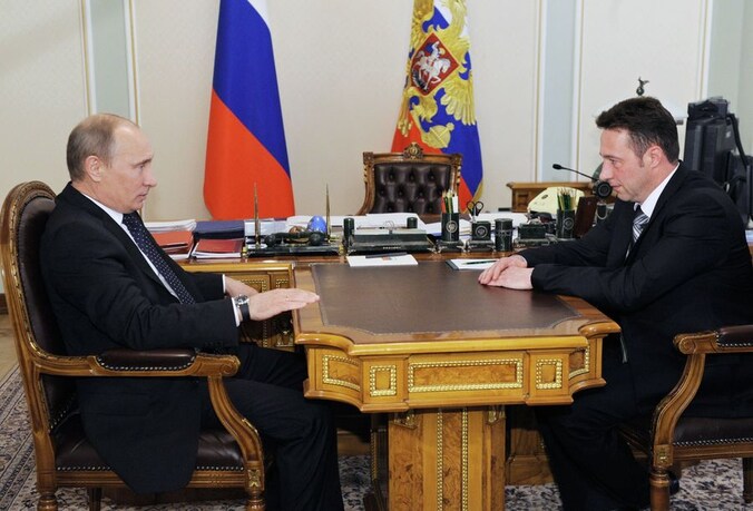 Vladimir Poetin en Igor Cholmanskich.