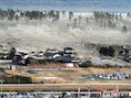 Een foto van de tsunami die Natori overspoelde op 11 maart 2011.
