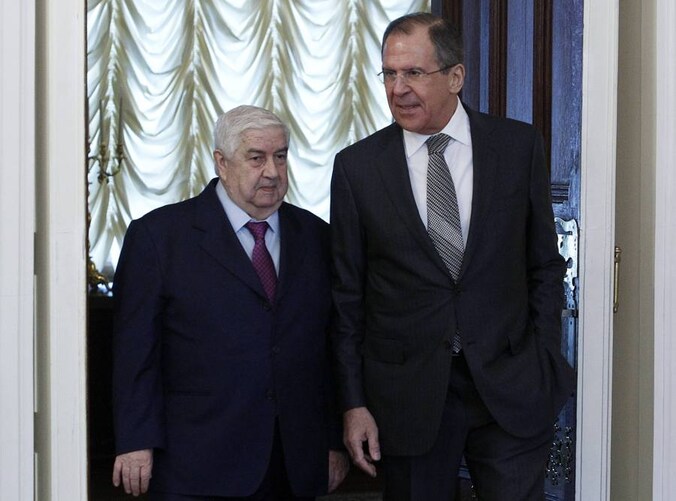 Walid al-Moualem (L) en Sergei Lavrov