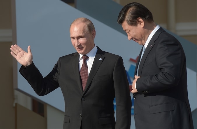 De Russische president Vladimir Poetin en de Chinese president Xi Jinping.