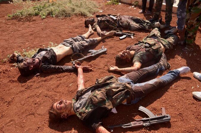 Gesneuvelde Syrische rebellen in Aleppo.