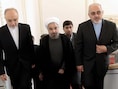 Nieuwe machthebbers van Iran. Van links af: Ali Akbar Salehi, het net aangestelde hoofd van het kernernegieprogramma, president Hassan Rouhani, en Mohamed Javad Zarif , de zaterdag benoemde minister van Buitenlandse Zaken.