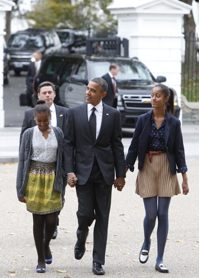 Obama met zijn dochters Sasha en Malia.