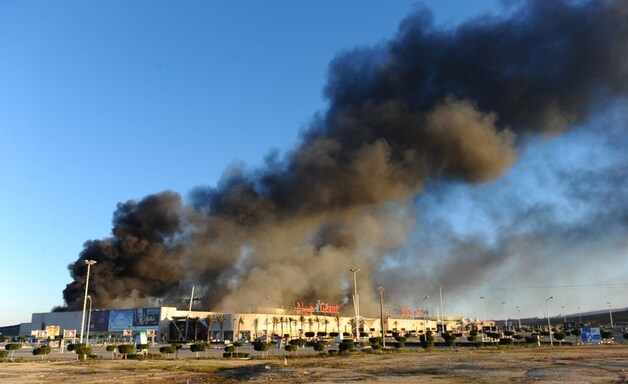 Ook in supermarkten werd brand gesticht en geplunderd.